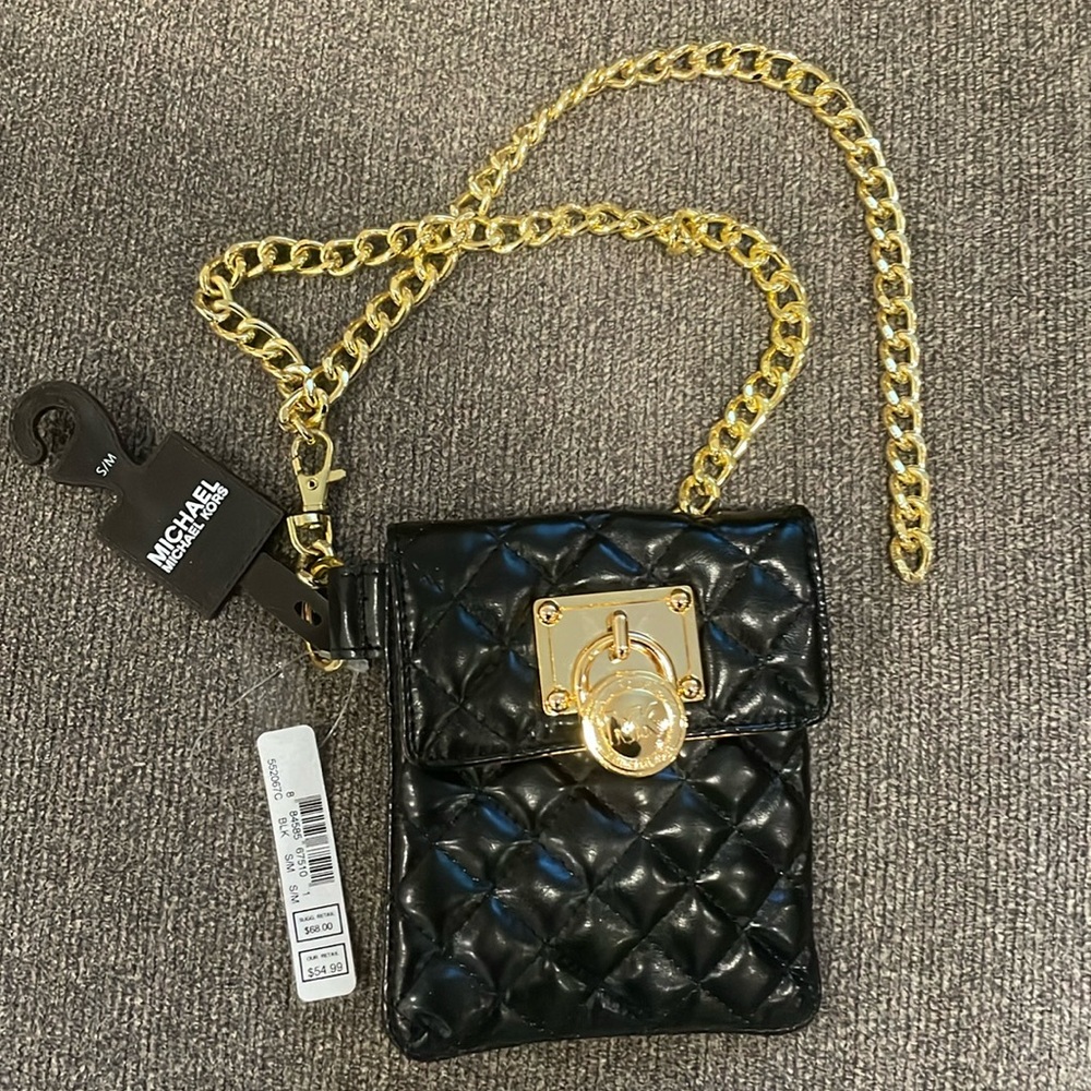 Michael Kors black waist belt bag with gold chain hardware.